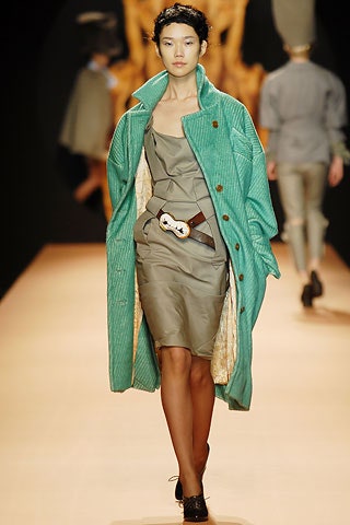 green coat gray dress with belt