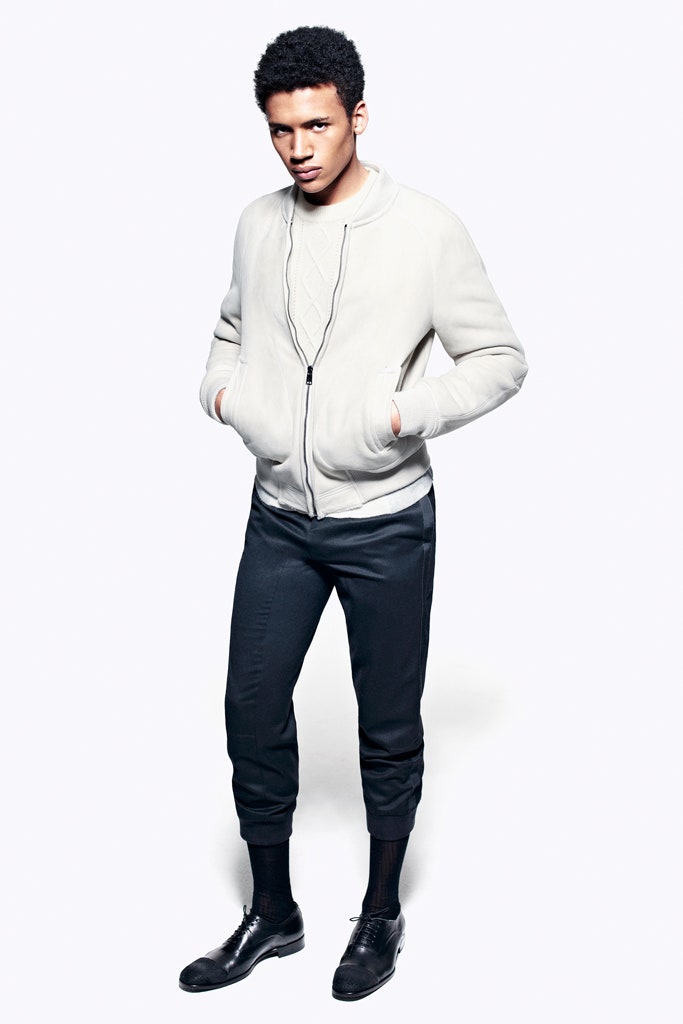 white fitted jacket with black pants