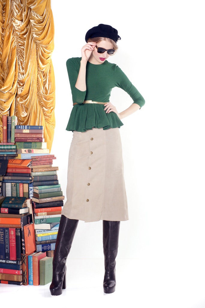 green fitted peplum top with beige skirt