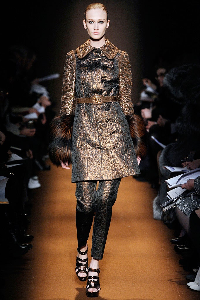 gold and brown fitted coat and pants