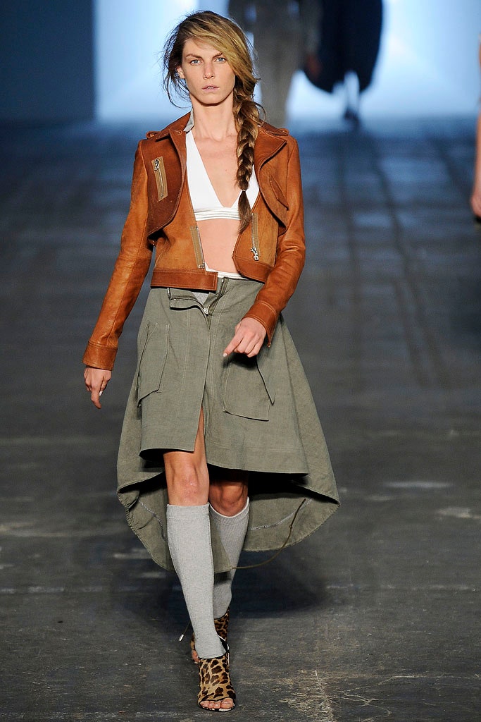 brown leather fitted jacket with gray skirt
