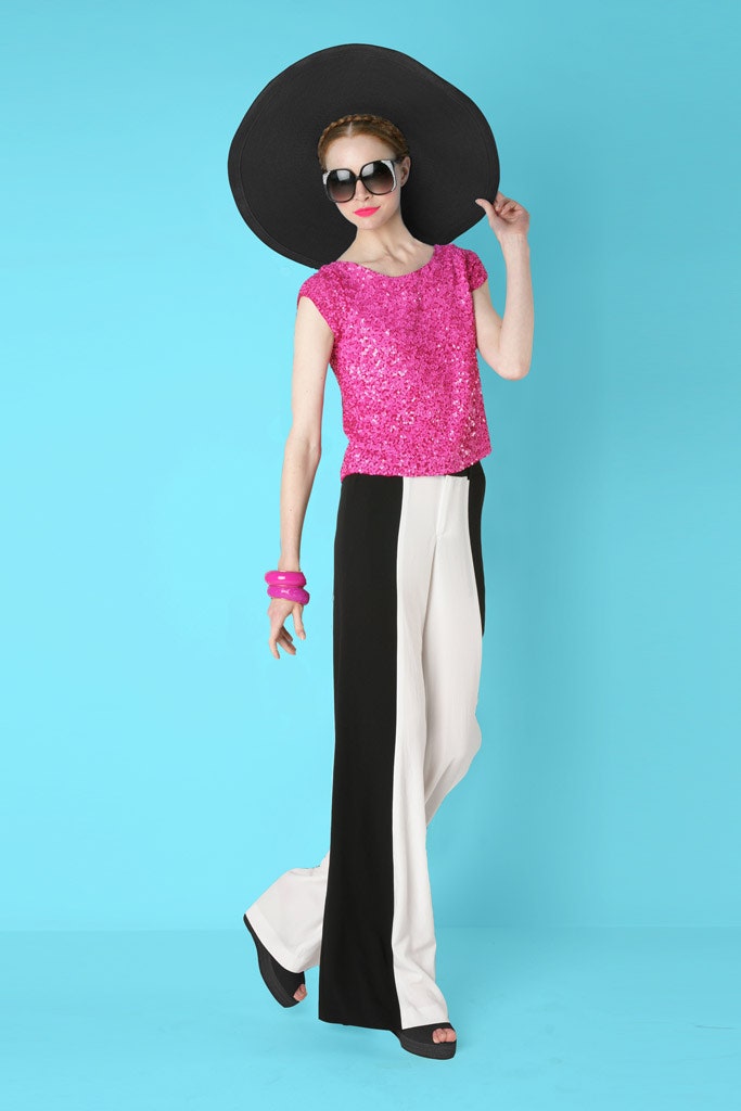 pink sequined top with wide-leg pants