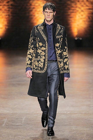 black embroidered coat with gray pants