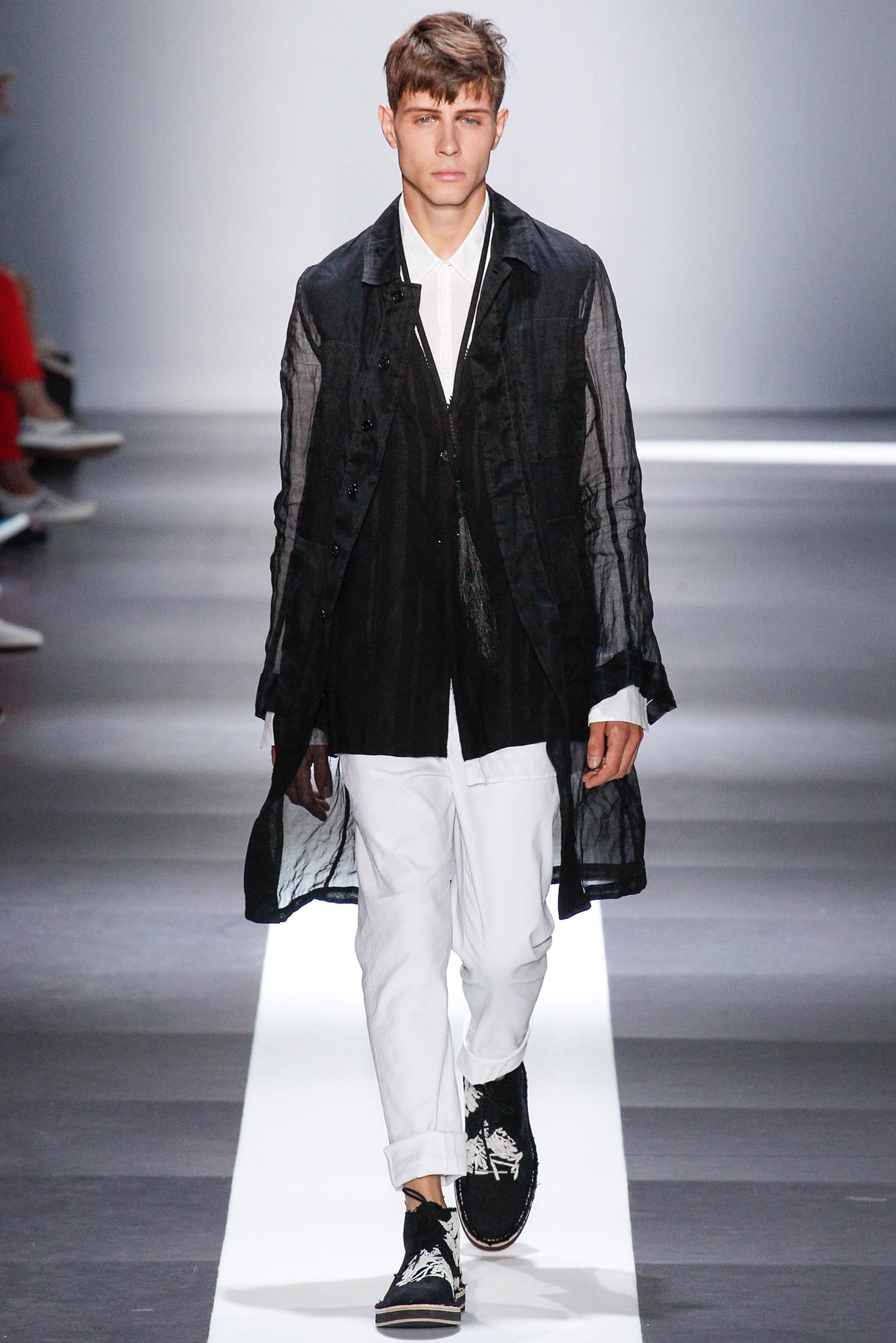 black coat white shirt and pants