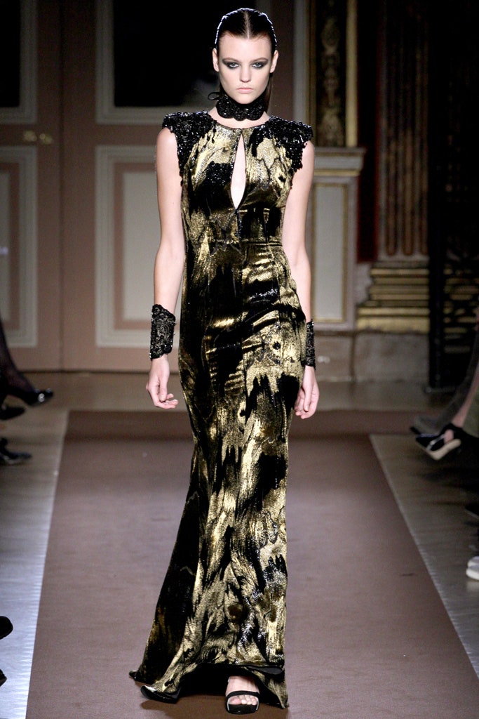 fitted black and gold velvet gown