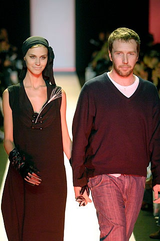 black silk sleeveless dress and navy sweater