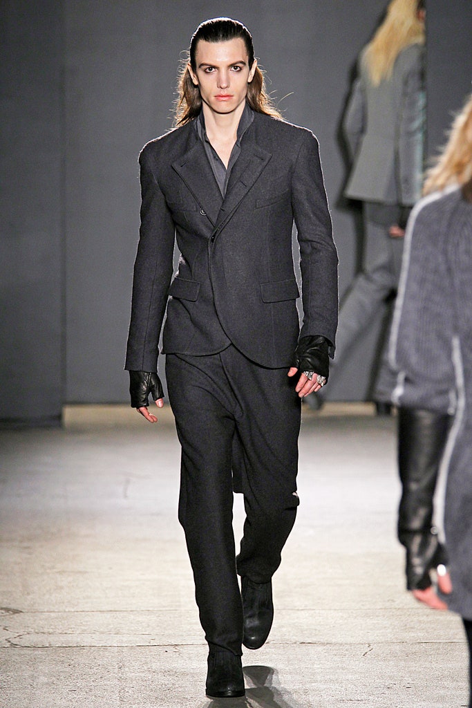 black tailored suit with gloves