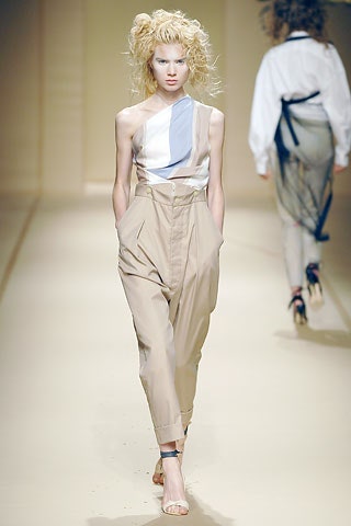 asymmetric blue and beige top with relaxed pants
