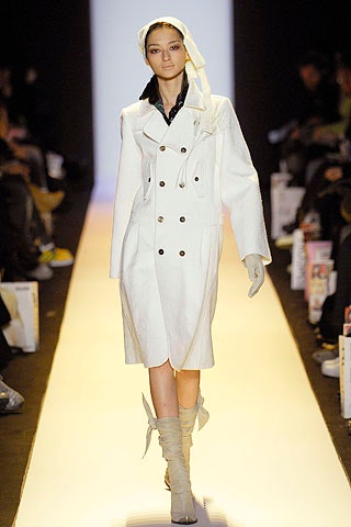 white fitted coat with gloves