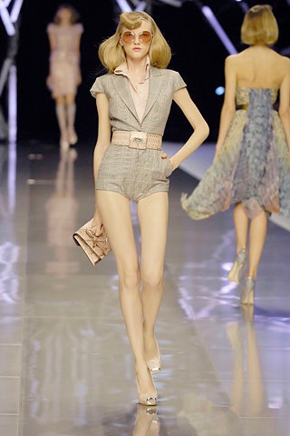 gray fitted romper with sunglasses