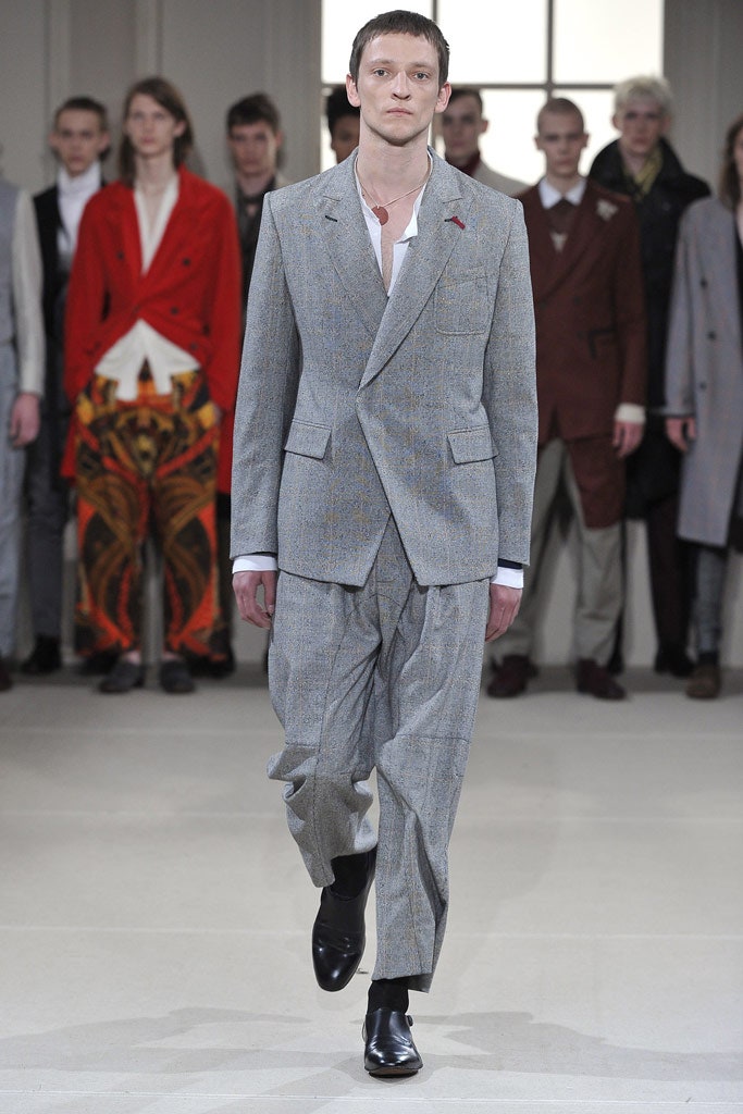 gray tailored suit with black shoes