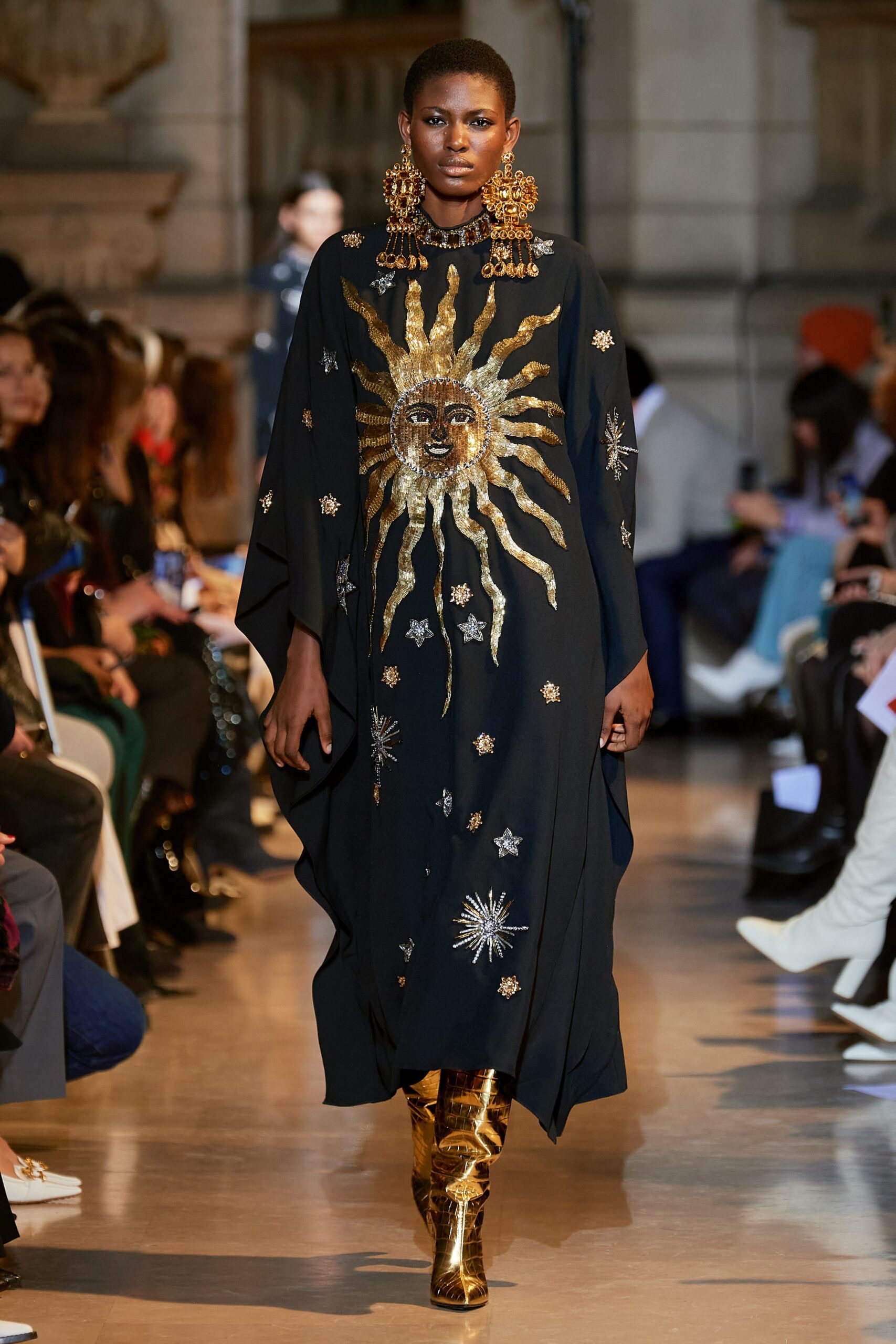 black silk embroidered midi dress with gold boots