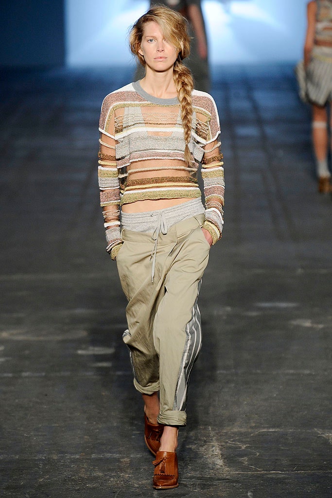 multi-striped sheer top with beige pants