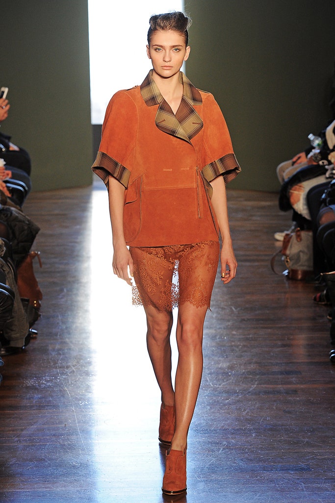 orange suede jacket with lace shorts