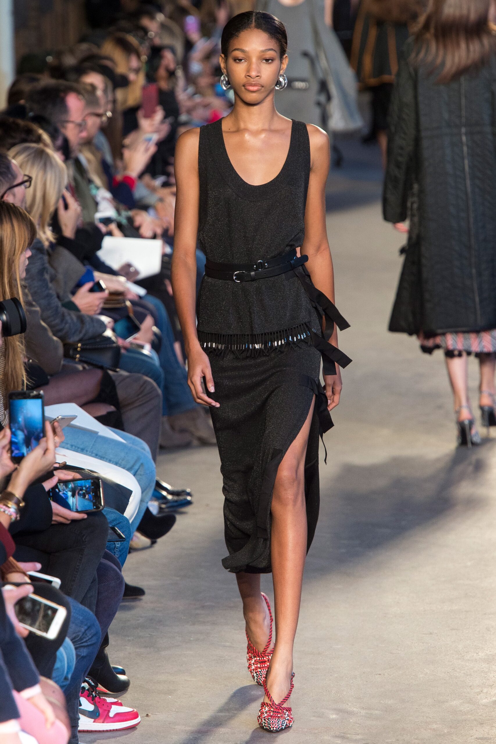 black fitted midi dress with fringe
