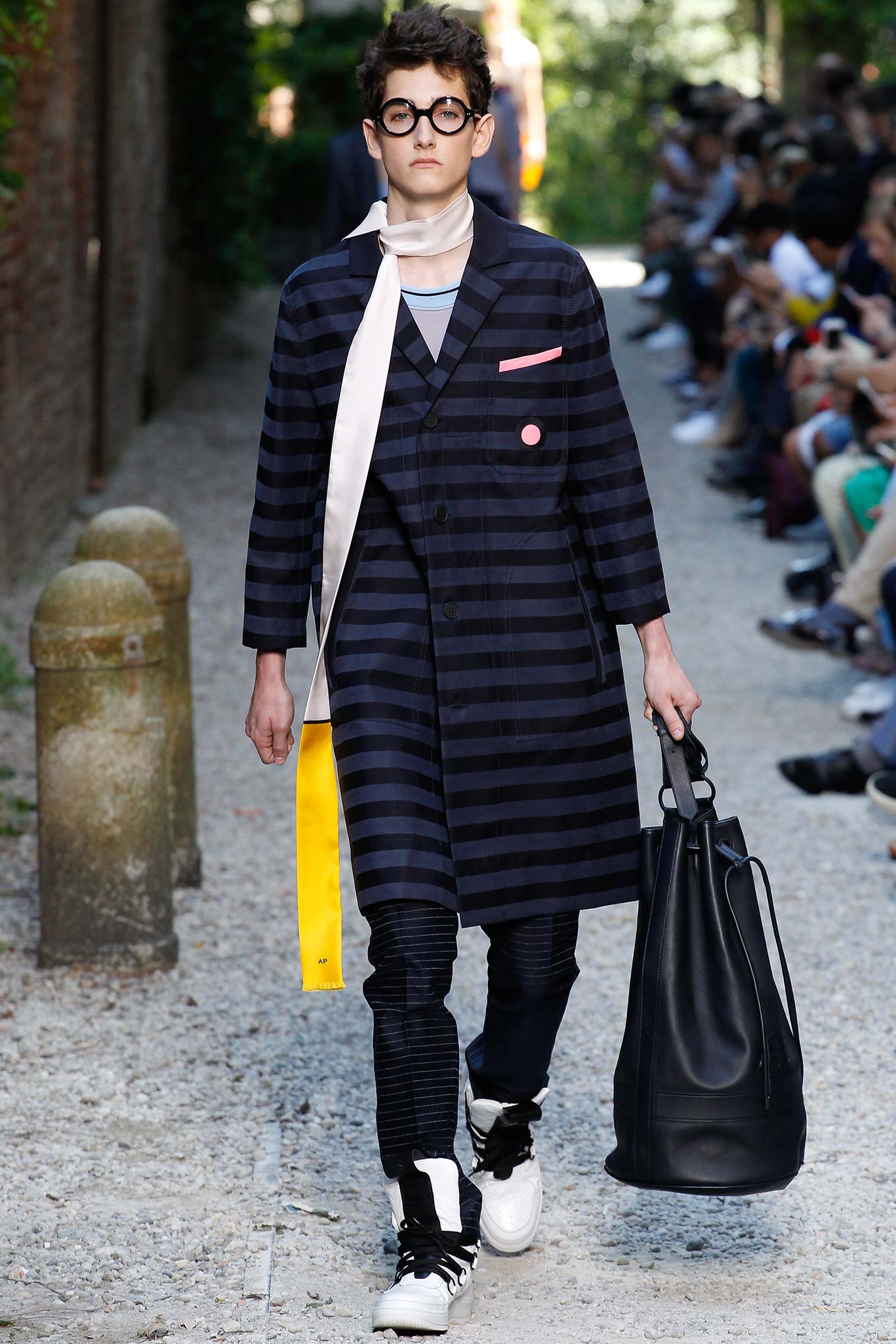 blue striped coat with black pants