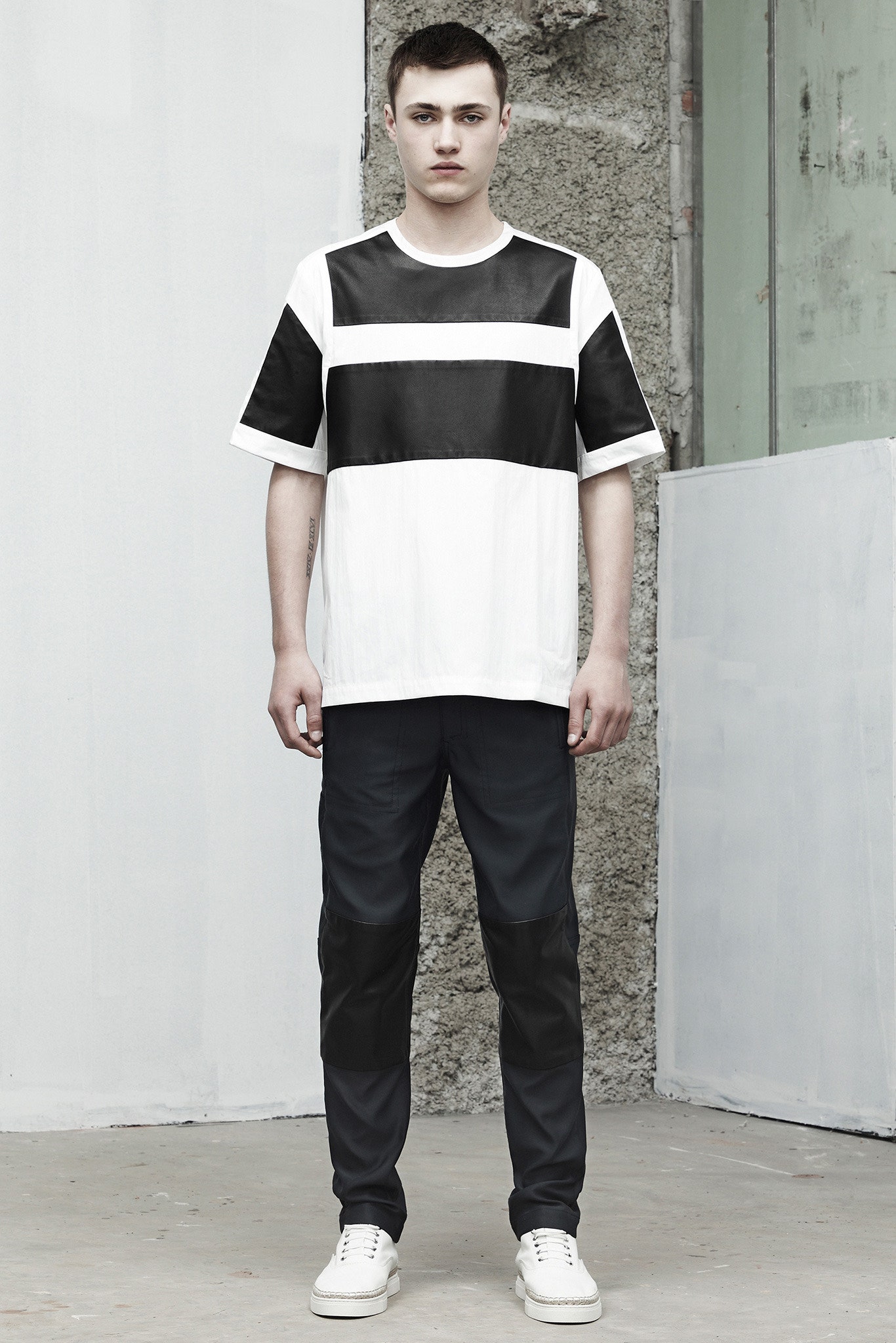 black and white color-blocked t-shirt with slim pants
