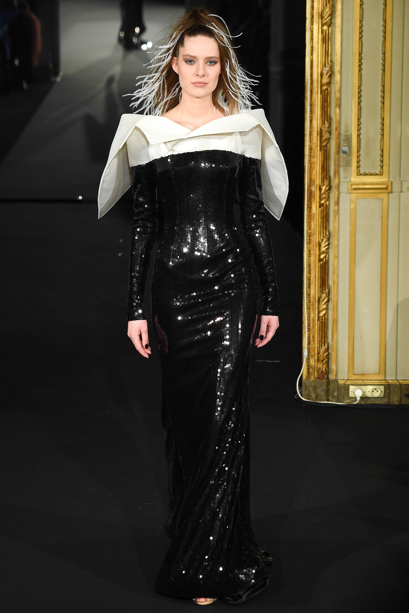 black sequined off-shoulder gown