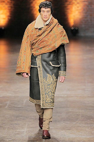 black leather coat with orange scarf