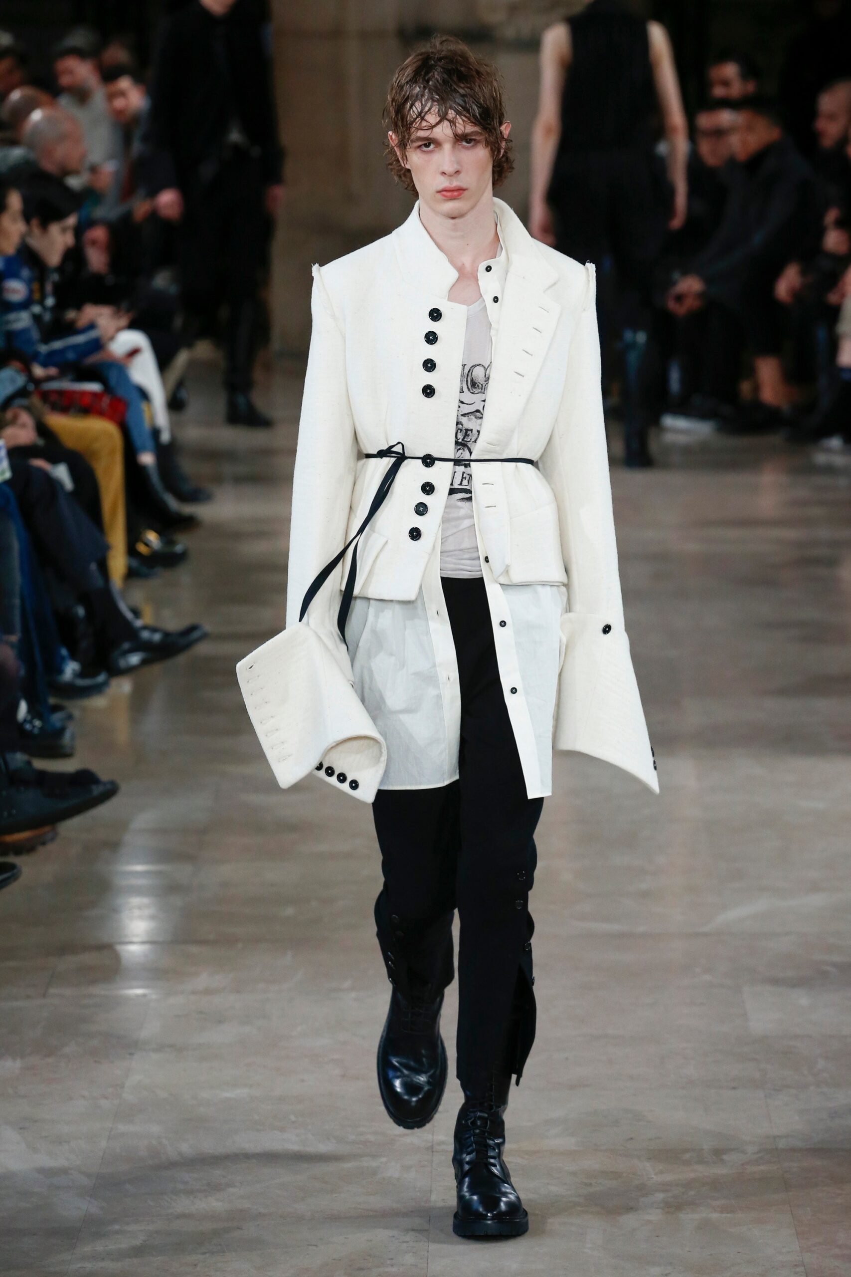 white structured jacket with black pants