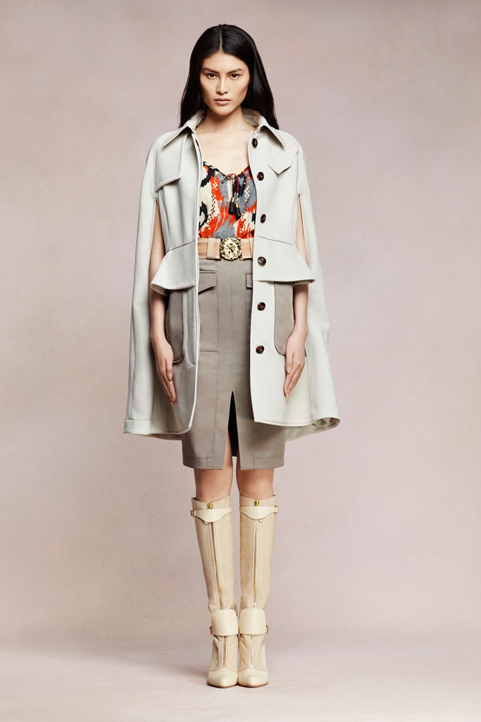 beige cape with multi blouse