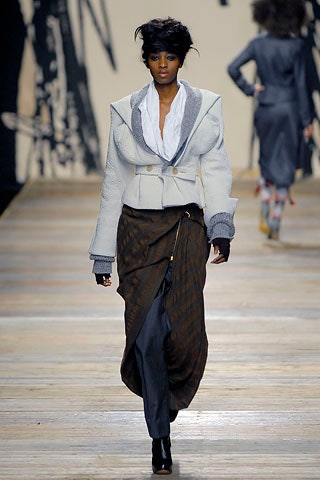 structured white jacket with pleated skirt