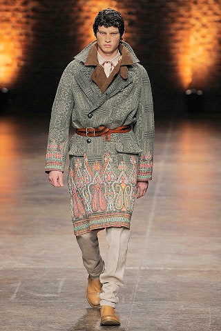 gray embroidered coat with beige pants