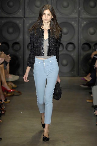 black fitted jacket gray top blue pants