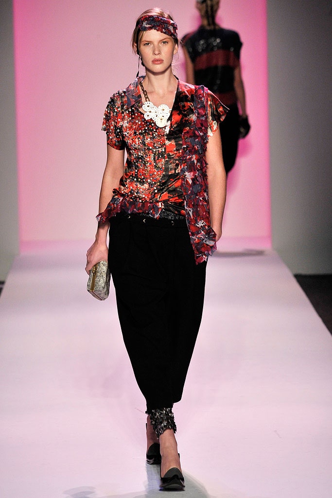 red and black fitted top with wide-leg pants