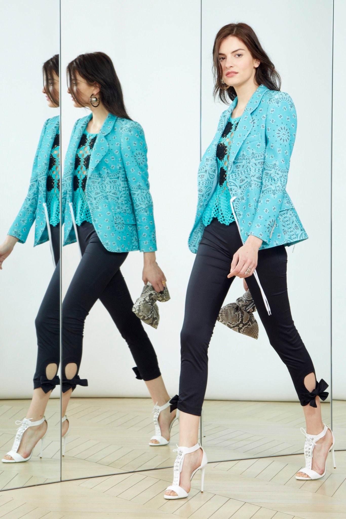 blue embroidered jacket with black top