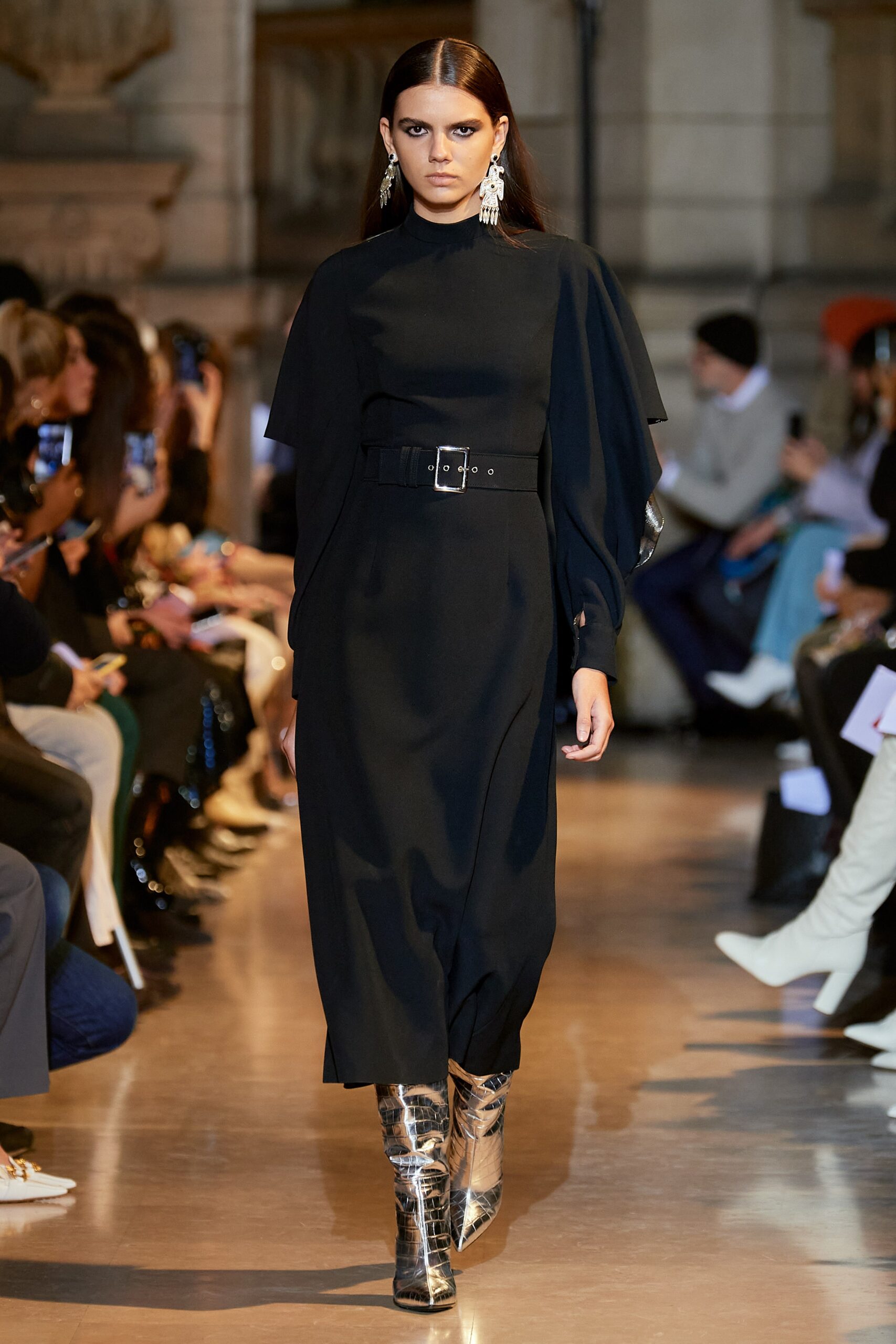 black fitted midi dress with silver boots