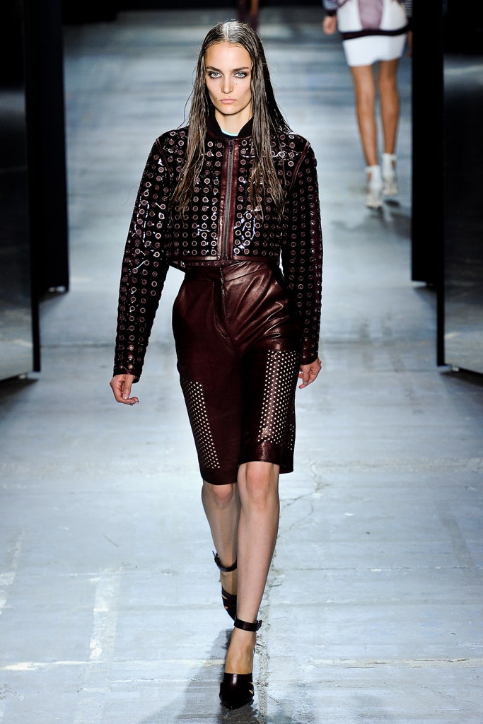 black leather long-sleeve collared fitted zippered embellished jacket