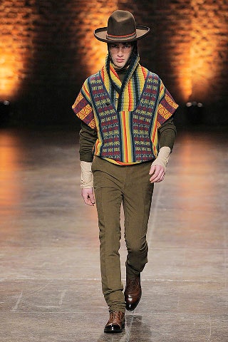 multi-colored wool poncho with tailored pants