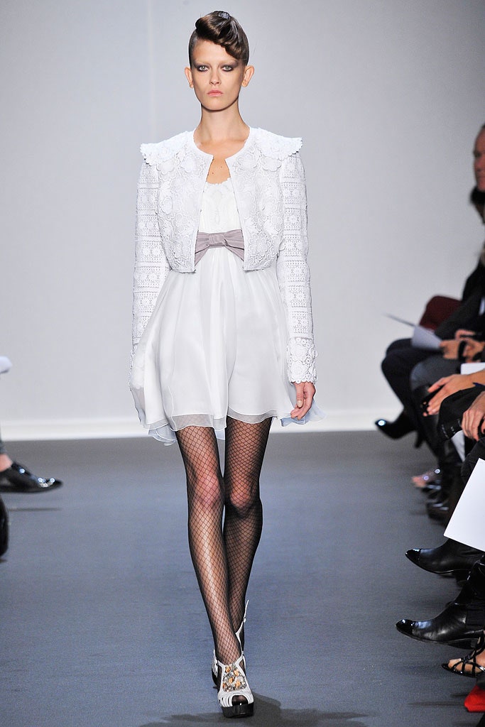 white embroidered jacket and dress