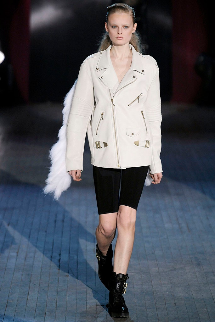 white leather fitted jacket with black shorts