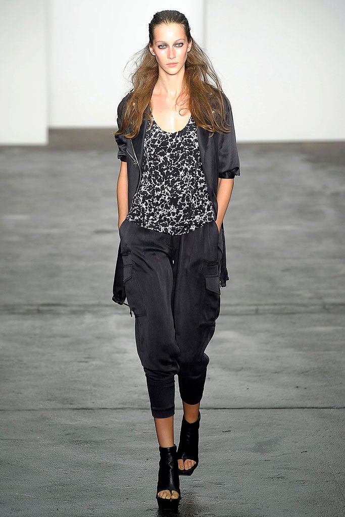 black silk top with cargo pants