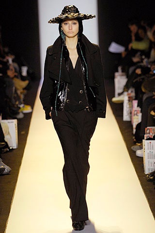 black fitted jacket and tailored pants