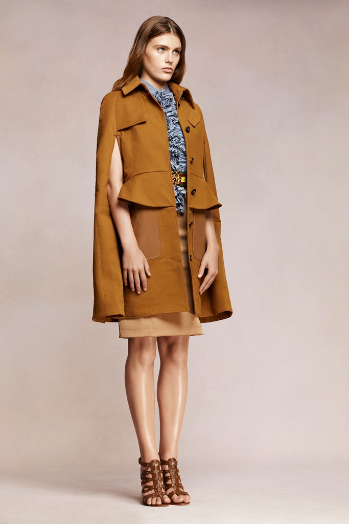 brown cape and beige dress