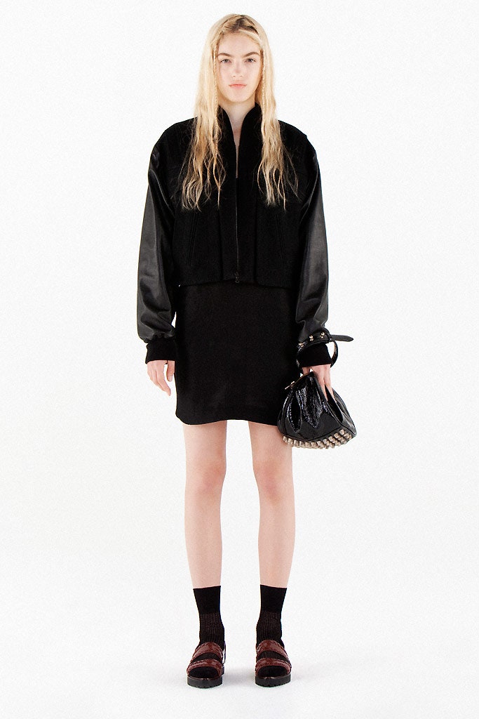 black fitted jacket and mini dress