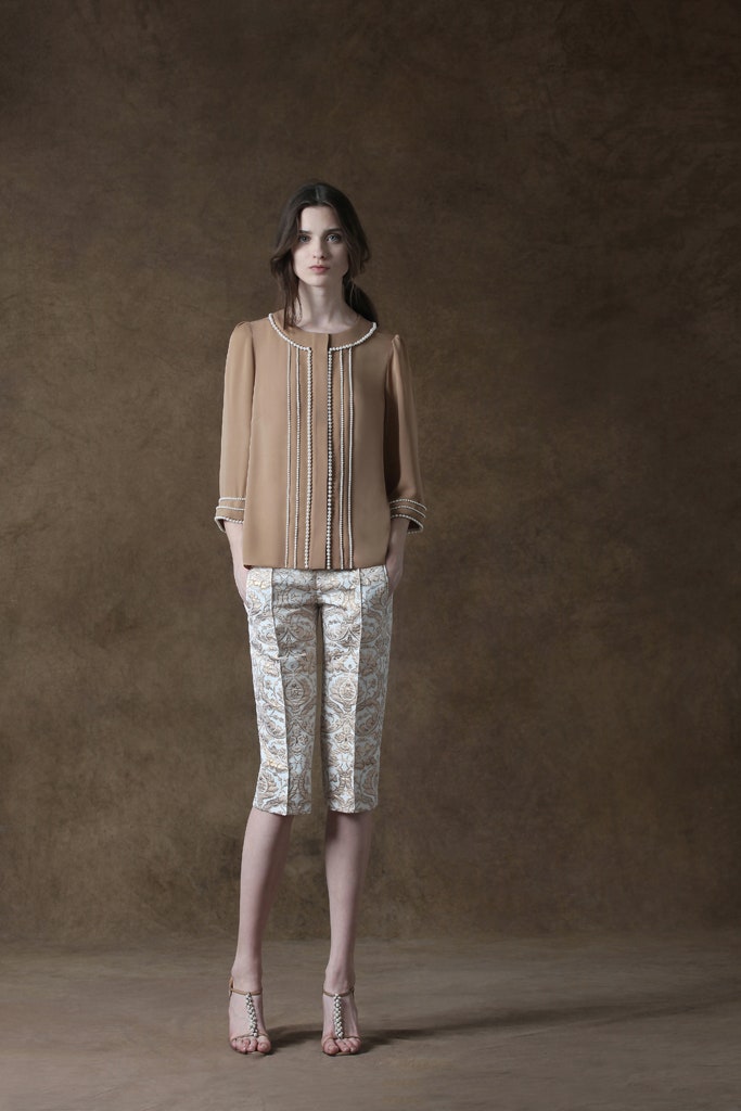 beige silk blouse with printed pants