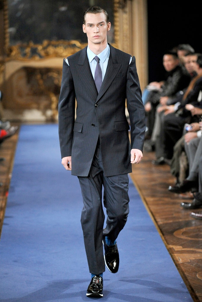 blue tailored suit with light blue shirt