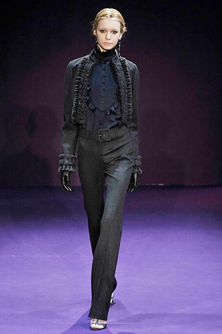 black fitted blouse and tailored pants