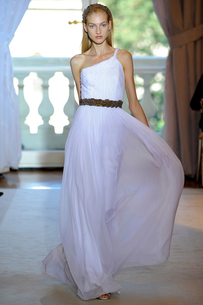 white pleated sleeveless gown