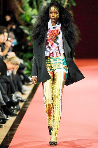 black blazer white shirt gold pants