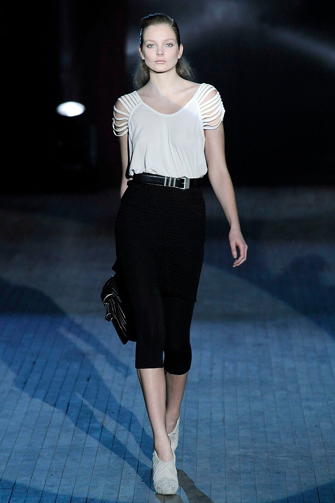white fitted top and black skirt