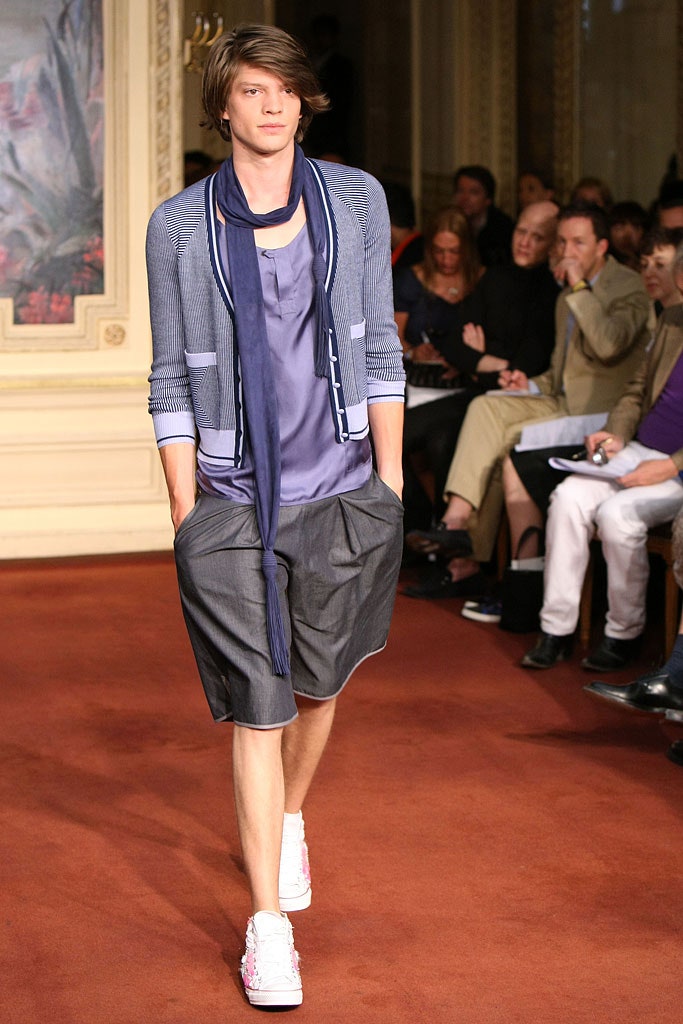 blue cardigan with purple top and gray shorts