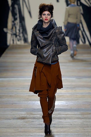 gray metallic fitted jacket and brown relaxed pants