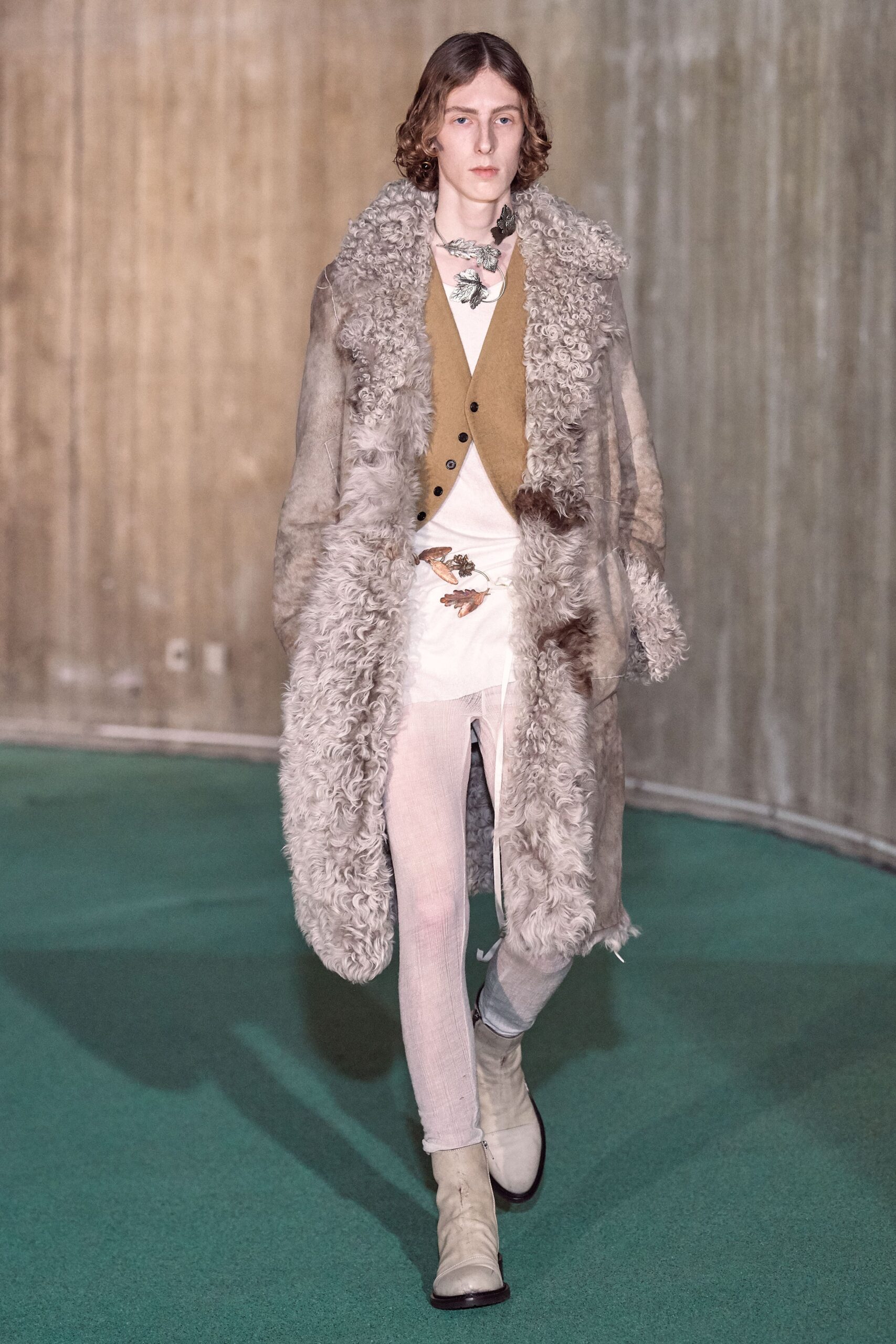 gray fur coat with brown vest