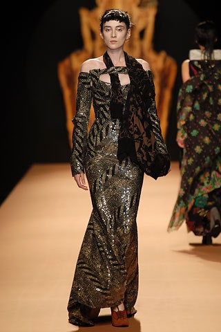 gold sequined off-shoulder gown