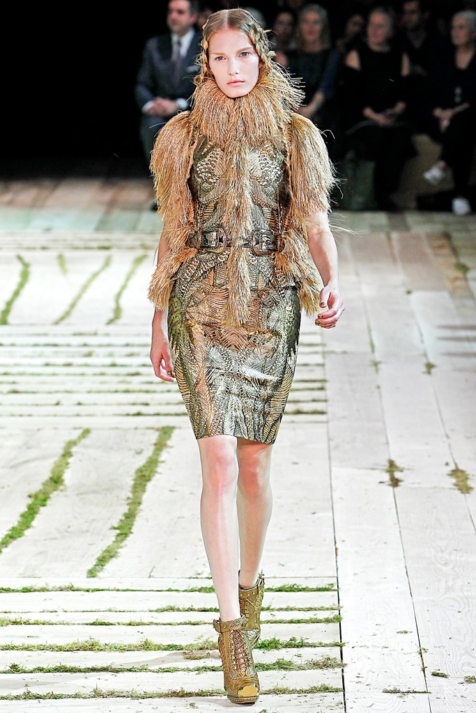 gold metallic fitted dress with fur cape